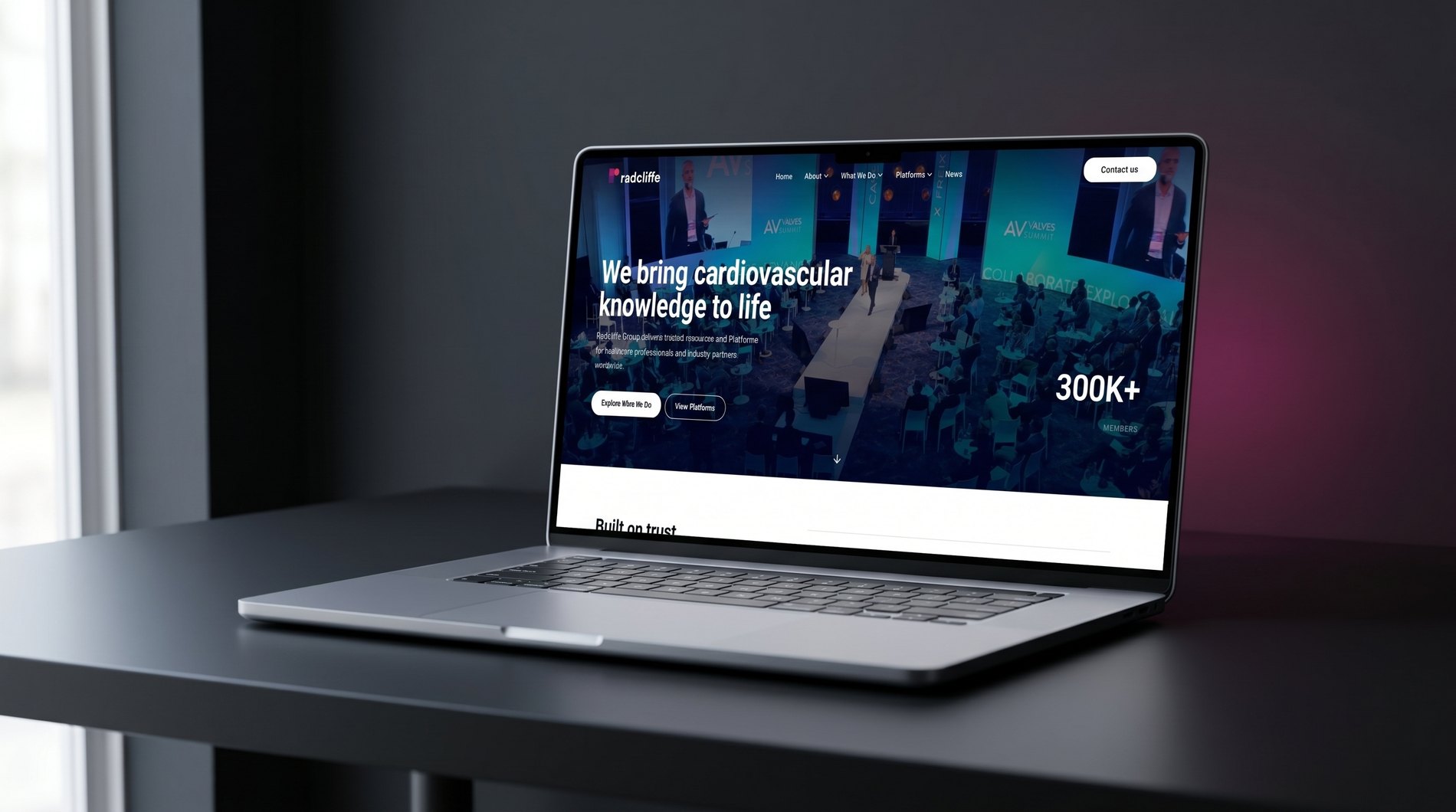 Radcliffe Group homepage on a laptop